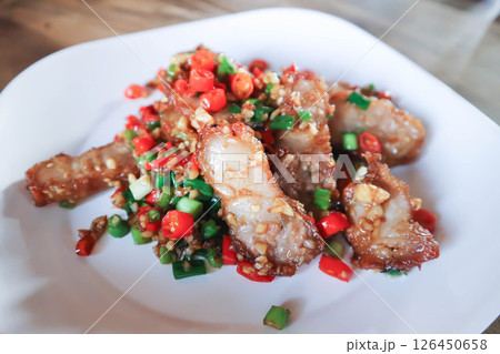 stir fried pork or deep fried pork , fried pork or crispy pork stir fried pork or deep fried pork , fried pork or crispy pork 126450658