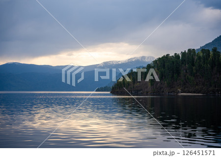Early morning landscape of Teletskoye lake in Altai Russia. Calm water, soft light and serene mountain atmosphere near Artybash Early morning landscape of Teletskoye lake in Altai Russia. Calm water, soft light and serene mountain atmosphere near Artybash 126451571
