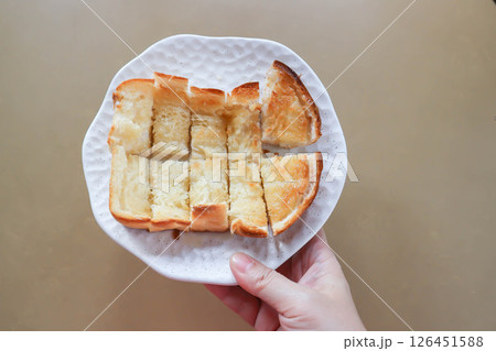 toast or bread with butter topping , toast bread or sliced bread 126451588
