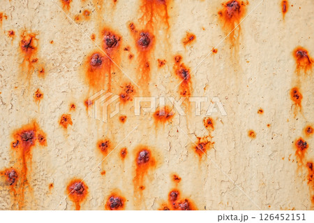 rusty corrosion spots on painted metal surface 126452151