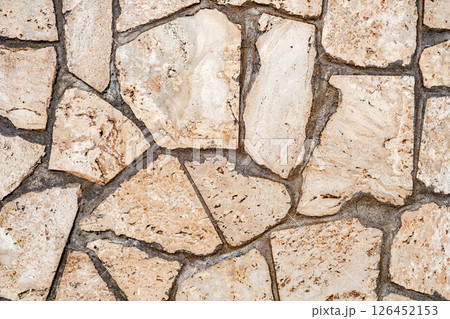 wall is lined with granite flat stones 126452153