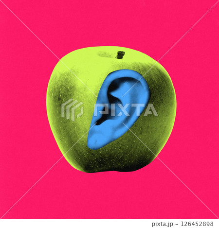 Contemporary art collage. Green apple with blue ear in side against magenta backdrop, challenging sensory logic and food familiarity. Contemporary art collage. Green apple with blue ear in side against magenta backdrop, challenging sensory logic and food familiarity. 126452898