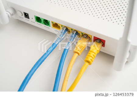 Ethernet cable with wireless router connect to internet service provider network. 126453379