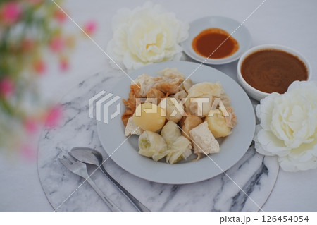 Siomay Indonesian Dish with Peanut Sauce and Steamed Food 126454054