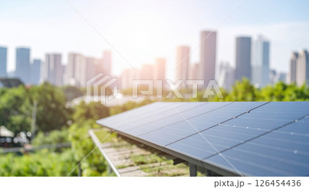 Solar panel installation rooftop with city skyline background Solar panel installation rooftop with city skyline background 126454436