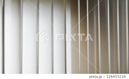 Close up of vertical metal bars creating pattern modern 126455216