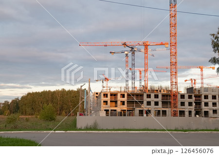 A construction crane on a blue sky background. 126456076