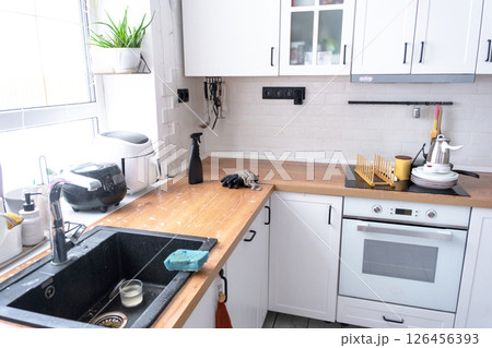 General cleaning in the kitchen, surface cleaning and grease removal products, a mess 126456393