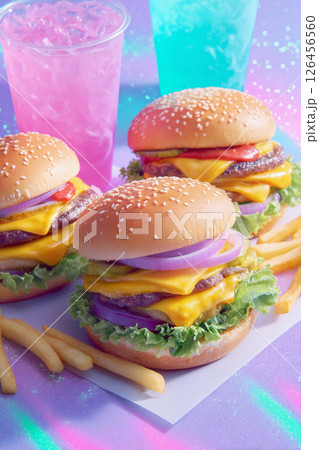advertising of bright neon trendy burgers with french fries and fast food drinks for restaurant menu 126456560