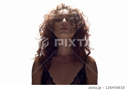 beautiful young woman with curly hair. isolated portrait beautiful young woman with curly hair. isolated portrait 126456610