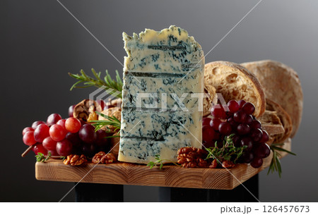 Gorgonzola cheese with ciabatta, walnuts, grapes, and aromatic herbs. 126457673
