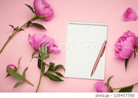 Beautiful pink peony flowers with empty notebook on pink background, copy space for your text or design. To do list 126457788