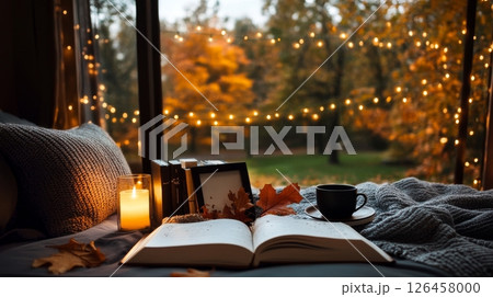 Cozy Reading Nook by the Window With Candles on a Rainy Day in a Forest Cabin 126458000
