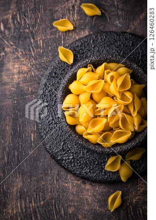 Raw pasta in shape of shells 126460283