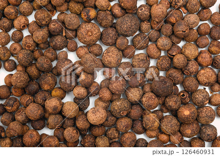 Black pepper background. Black peppercorns spices 126460931