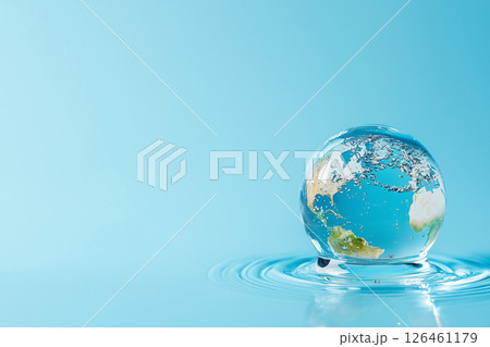 globe in the shape of a water drop in water, world water day 126461179