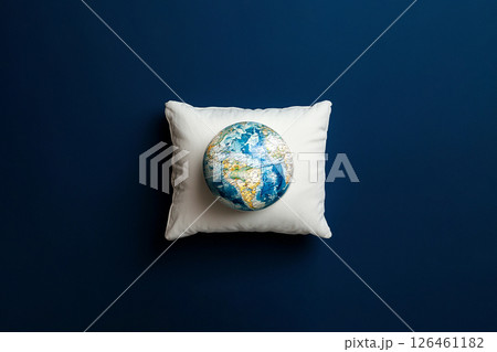 world sleep day, globe on a sleeping pillow, top view 126461182