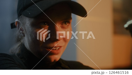 Close Up of Aggressive Female Criminal Aiming the Gun, Talking to Unrecognizable Opponent Close Up of Aggressive Female Criminal Aiming the Gun, Talking to Unrecognizable Opponent 126461516