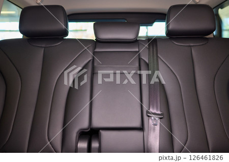 Car back seat with headrest and arm rest, a comfortable automotive fixture 126461826