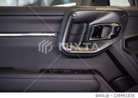 A car door with trim showcasing automotive design details 126461838