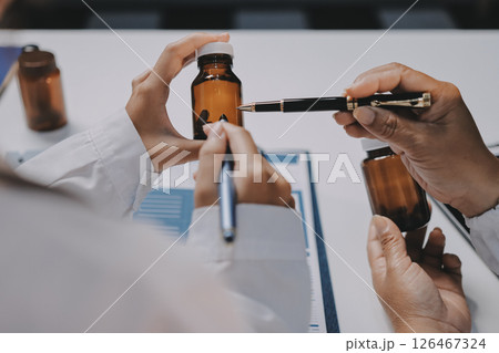 doctors and nurse having informal meeting in hospital canteen doctors and nurse having informal meeting in hospital canteen 126467324