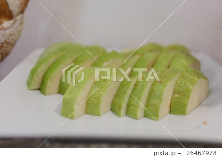 Sliced green guava Stack Guavas on white background Sliced green guava Stack Guavas on white background 126467978