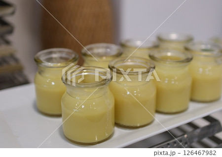 Creamy Mango Sago Dessert, is a sweet dessert from Hong Kong. Made by puree mango, sago pearl, and Coconut milk with toping sliced mango. Served on jar and served cold. Creamy Mango Sago Dessert, is a sweet dessert from Hong Kong. Made by puree mango, sago pearl, and Coconut milk with toping sliced mango. Served on jar and served cold. 126467982