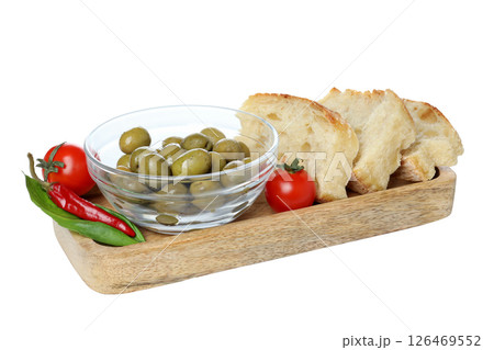 PNG, olives, tomato and bread on a stand, isolated on white background. PNG, olives, tomato and bread on a stand, isolated on white background. 126469552