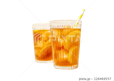Two clear glasses of iced tea filled with lemon slices are refreshing, isolated on white 126469557