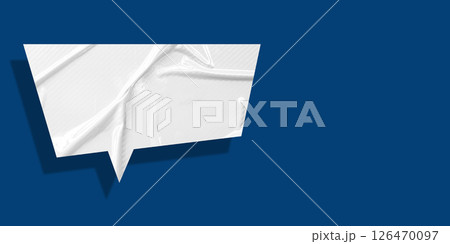 White speech bubble crumpled paper isolated on blue background White speech bubble crumpled paper isolated on blue background 126470097