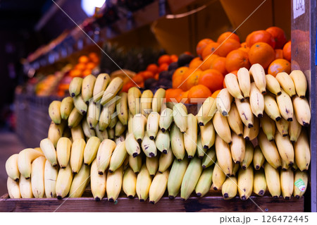 Stand of bananas in greengrocery 126472445