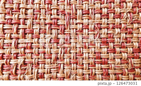 Textured woven fabric with a geometric pattern in neutral tones. 126473031