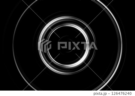 Blurred, abstract white ring on black background Blurred, abstract white ring on black background 126476240