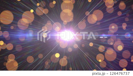 Image of glowing light spots moving over dark background 126476737