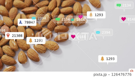 Image of media icons over almond 126476776