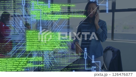 Image of computer circuit board with data processing over african american businesswoman 126476877