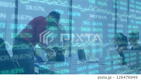 Image of financial data processing over diverse colleagues discussing work in office Image of financial data processing over diverse colleagues discussing work in office 126476949