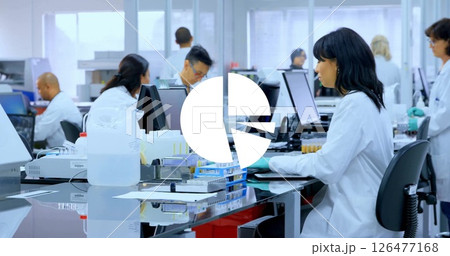 Image of diagrams over diverse scientists working in lab 126477168