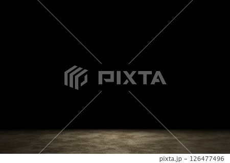 Light shining down on brown sand floor in dark room with copy space, abstract background 126477496