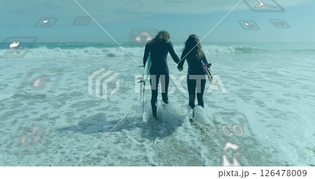 Image of network of eco icons over happy caucasian couple with surfboards Image of network of eco icons over happy caucasian couple with surfboards 126478009