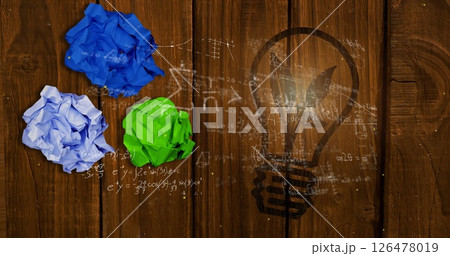 Image of mathematical equations over lightbulb and crumpled paper Image of mathematical equations over lightbulb and crumpled paper 126478019