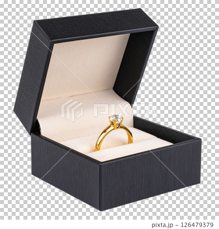 Open wooden gift box with a gold engagement ring Open wooden gift box with a gold engagement ring 126479379