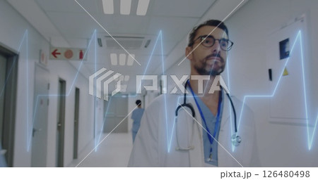 Image of data processing over caucasian male doctor Image of data processing over caucasian male doctor 126480498