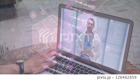 Video call with doctor on laptop, hand typing on keyboard, telemedicine concept Video call with doctor on laptop, hand typing on keyboard, telemedicine concept 126482859