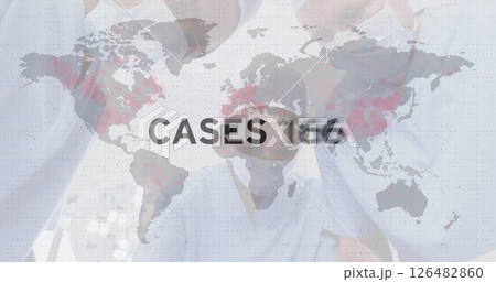 Healthcare workers analyzing global cases data on world map overlay 126482860