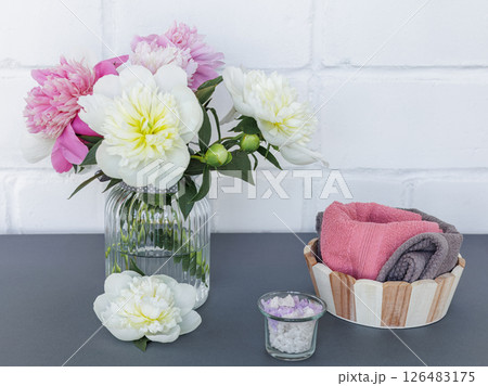 Spa products for facial and body care with soft terry towels. Spa products for facial and body care with soft terry towels. 126483175