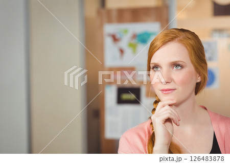 Thoughtful woman in office with hand on chin, planning creative ideas, copy space Thoughtful woman in office with hand on chin, planning creative ideas, copy space 126483878