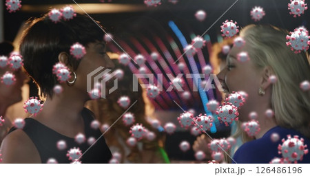 Image of cells floating over multi-ethnic group of people dancing at a party Image of cells floating over multi-ethnic group of people dancing at a party 126486196