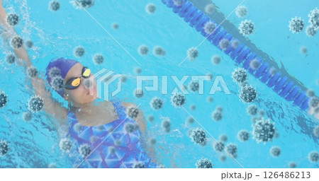 Swimmer in pool surrounded by virus particles, illustrating health risks Swimmer in pool surrounded by virus particles, illustrating health risks 126486213