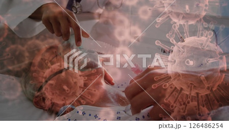 Assisting patient with oxygen mask, healthcare worker illustrating coronavirus pandemic 126486254